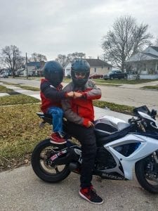 Father and son ride motorcycles in Hazel Park