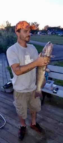 Man with Fish in his hand