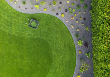 Taking Car of Residential Backyard Lawn