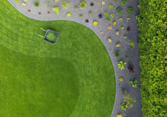 Taking Car of Residential Backyard Lawn