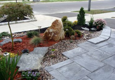 Landscaping project in front of the house, rock garden, travertine tiles, planting evergreens design